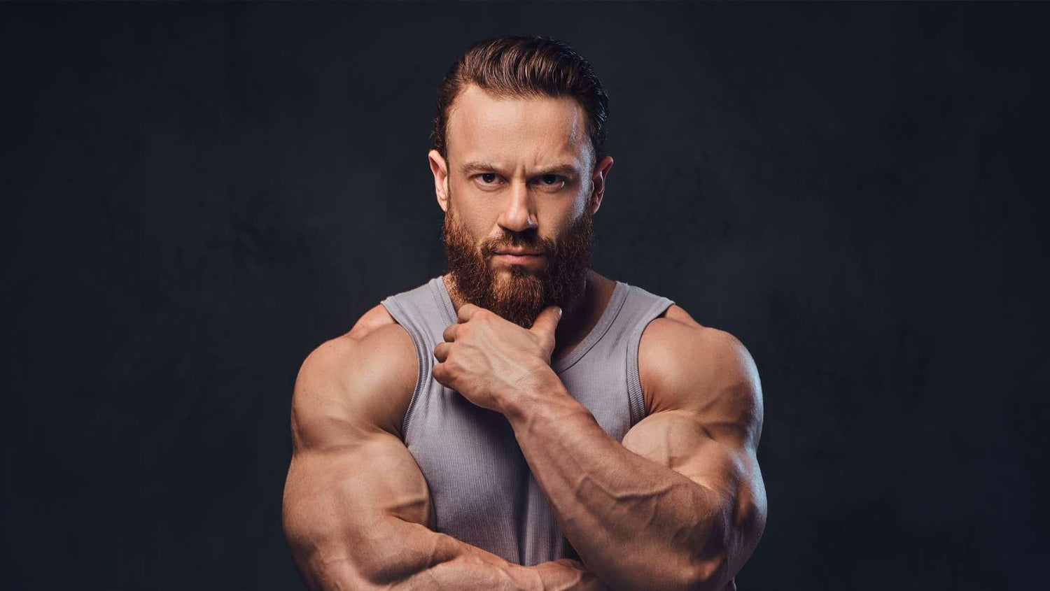 Bearded Bodybuilder Dressed in a Tank Top