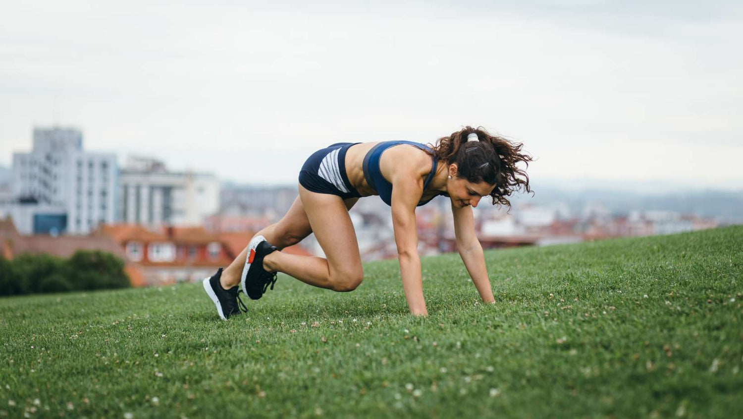 Female athlete doing burpees