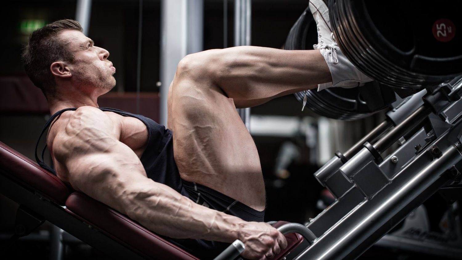 Man in Gym Training at Leg Press